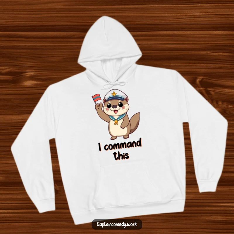 Funny otter captain hoodie, a happy sea mammal saluting with a tiny flag, radiating cozy, humorous, and nautical vibes.