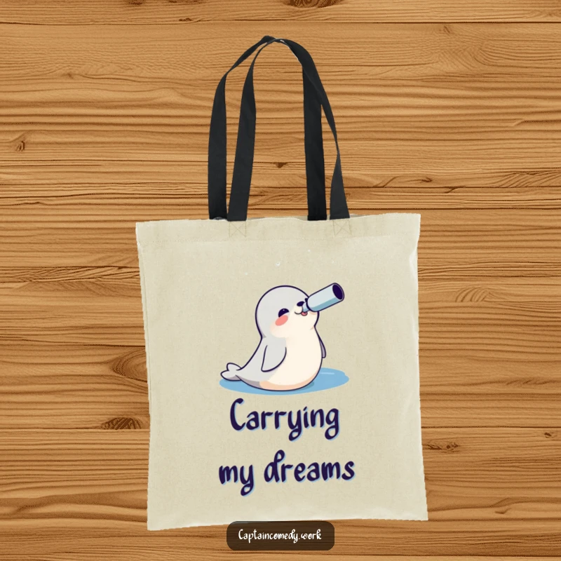 Funny Seal Explorer Tote Bag showing a cheerful seal with a spyglass, looking out at a vast ocean, perfect for everyday adventures.